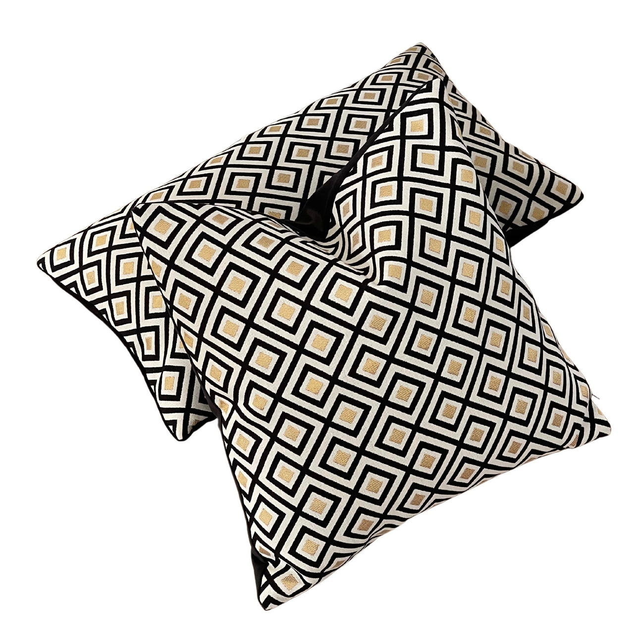 Art Deco luxury pillow in black, white, and gold.


