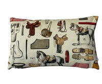 Thumbnail for Horse and saddle motif on cream cotton with crisp overlocked seams.