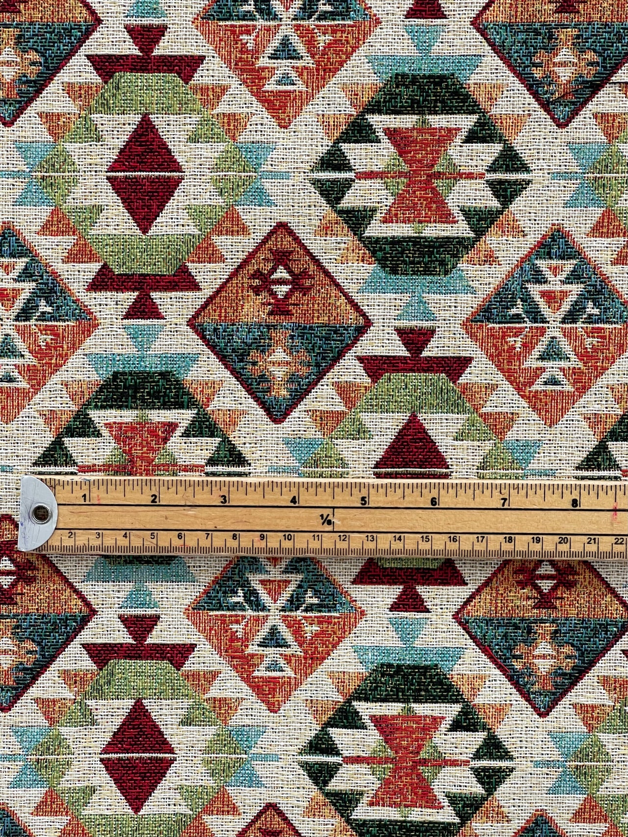 Vibrant cherry red and green geometric print fabric

