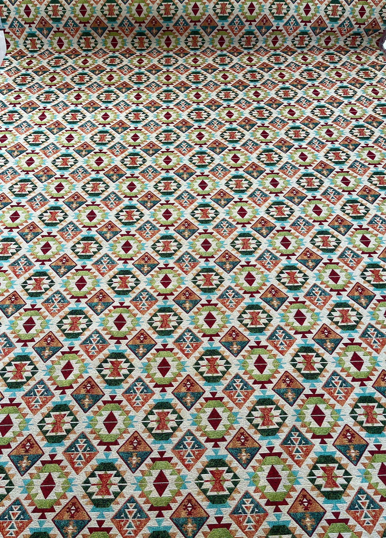 Folded kilim fabric showcasing intricate design


