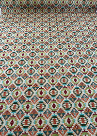 Thumbnail for Folded kilim fabric showcasing intricate design

