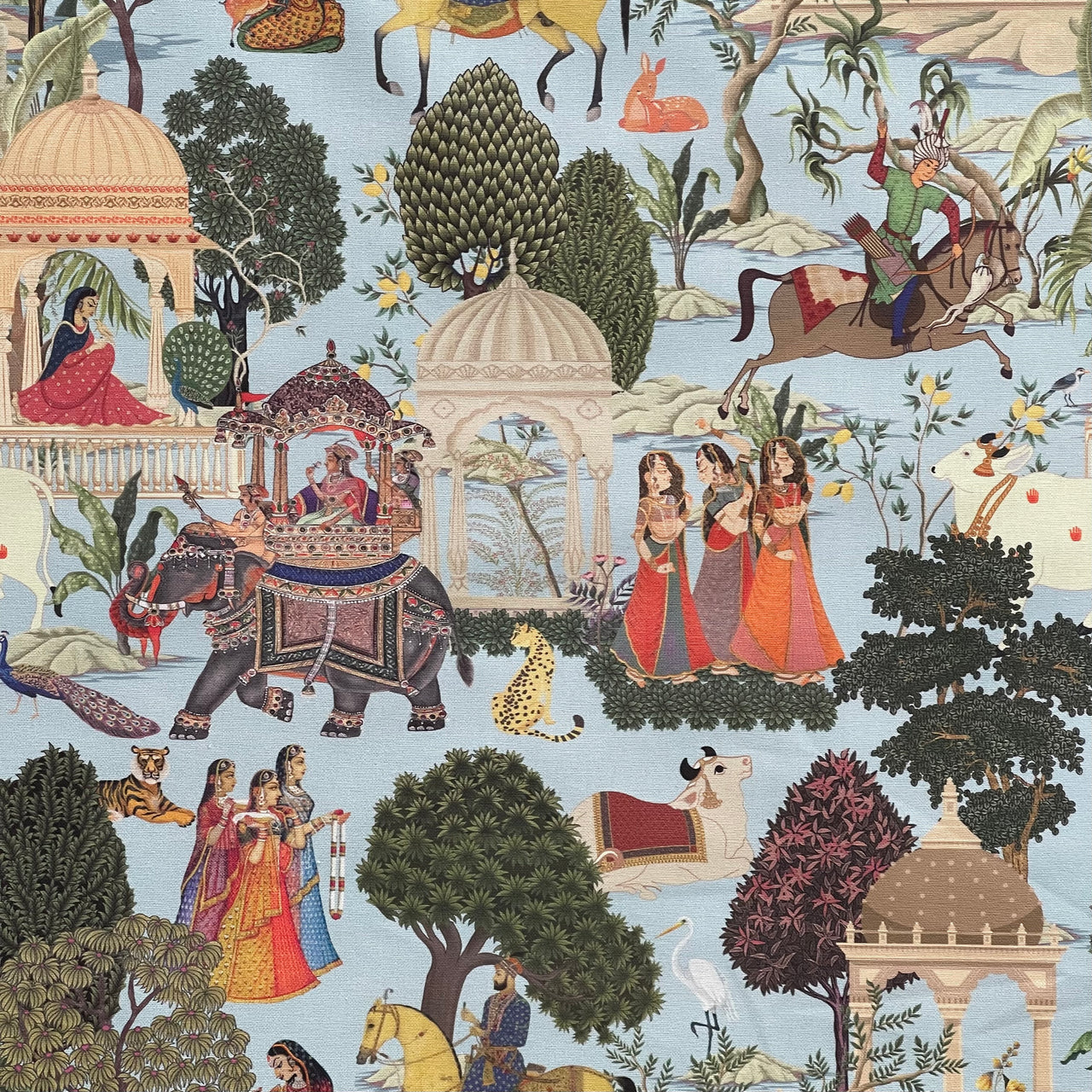 Zoomed-in detail of Regalia fabric showing Maharaja on horse, tiger, women in saris, and decorative trees.