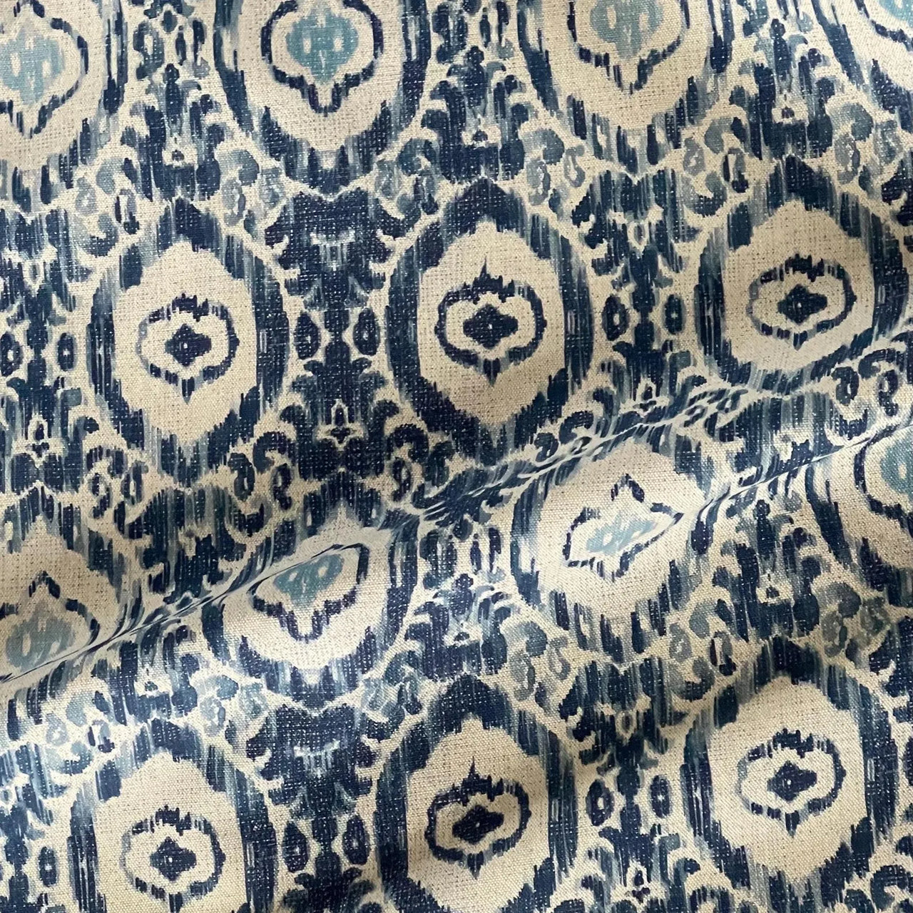 Linen look cotton fabric with ikat design