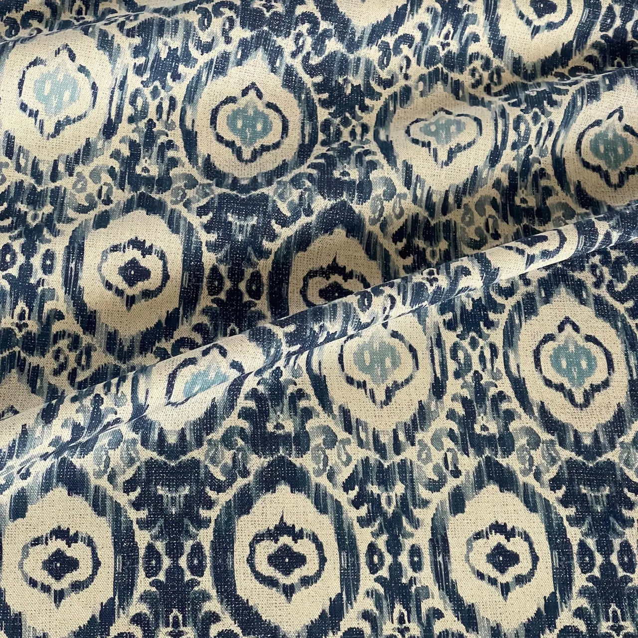 Patterned fabric with blue and beige design