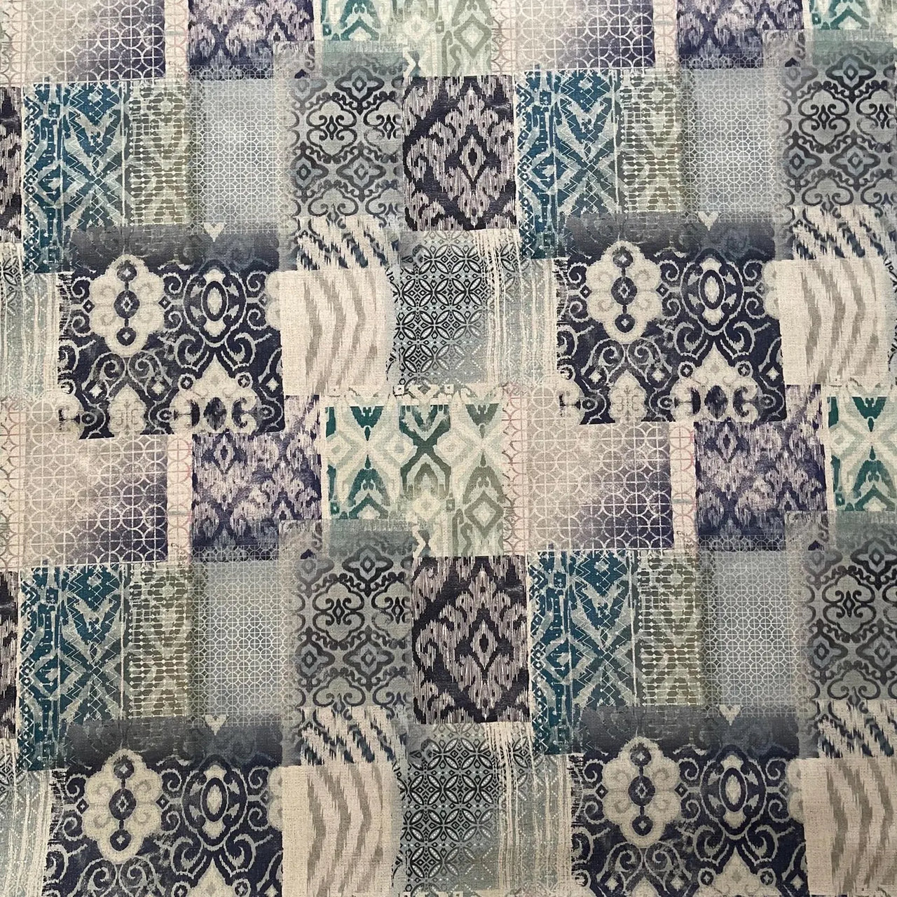 Blue patchwork fabric with modern ikat styling