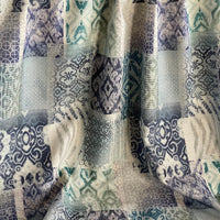 Thumbnail for Blue geometric patchwork fabric with soft distressed finish