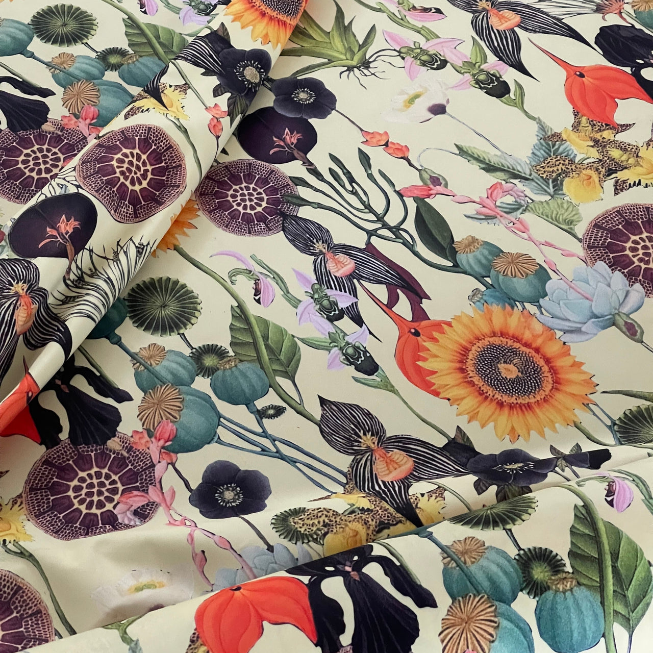 Fabric detail showing printed velvet flower motifs