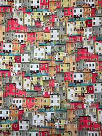 Thumbnail for Detailed view of Positano-inspired printed cotton fabric, highlighting the texture and intricate architectural house designs.