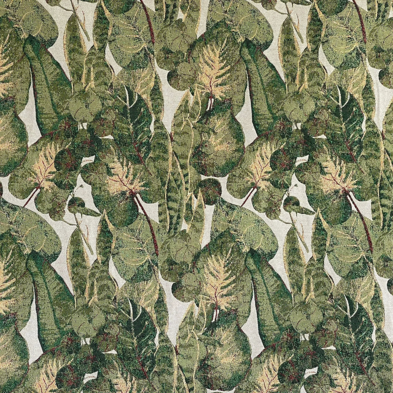 Pattern of green leaves on a light background