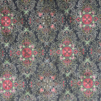Thumbnail for Organic cotton fabric with red and green mandala-style repeats