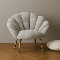 Thumbnail for Modern scalloped velvet chair with light grey tiles effect fabric and gold legs on wooden floor.