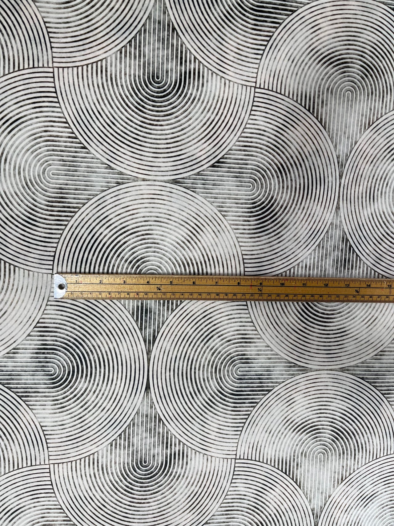 Geometric tiles pattern fabric for stylish furnishings.