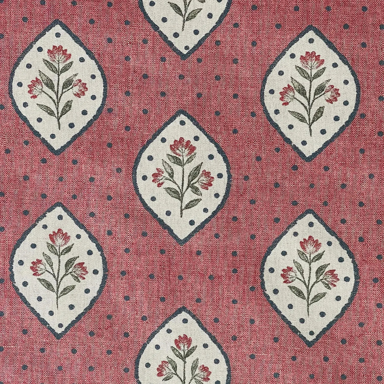 Floral medallion fabric in rose pink with cream motifs