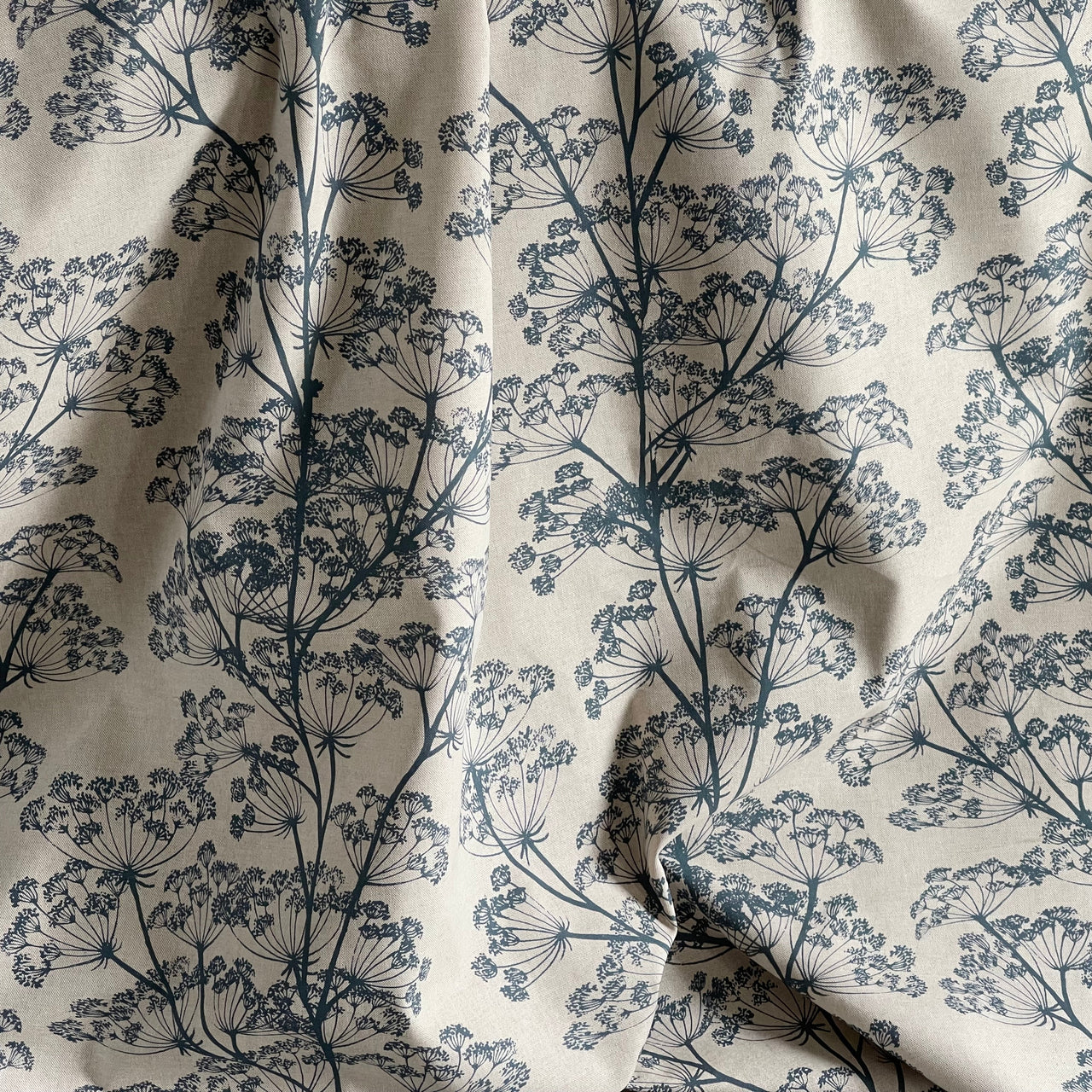 Indigo blue floral curtain fabric with soft natural woven texture
