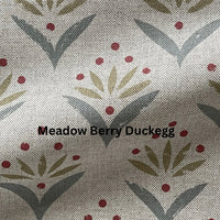 Thumbnail for Fabric swatch with a pattern of leaves and berries labeled 'Meadow Berry Duckegg'.