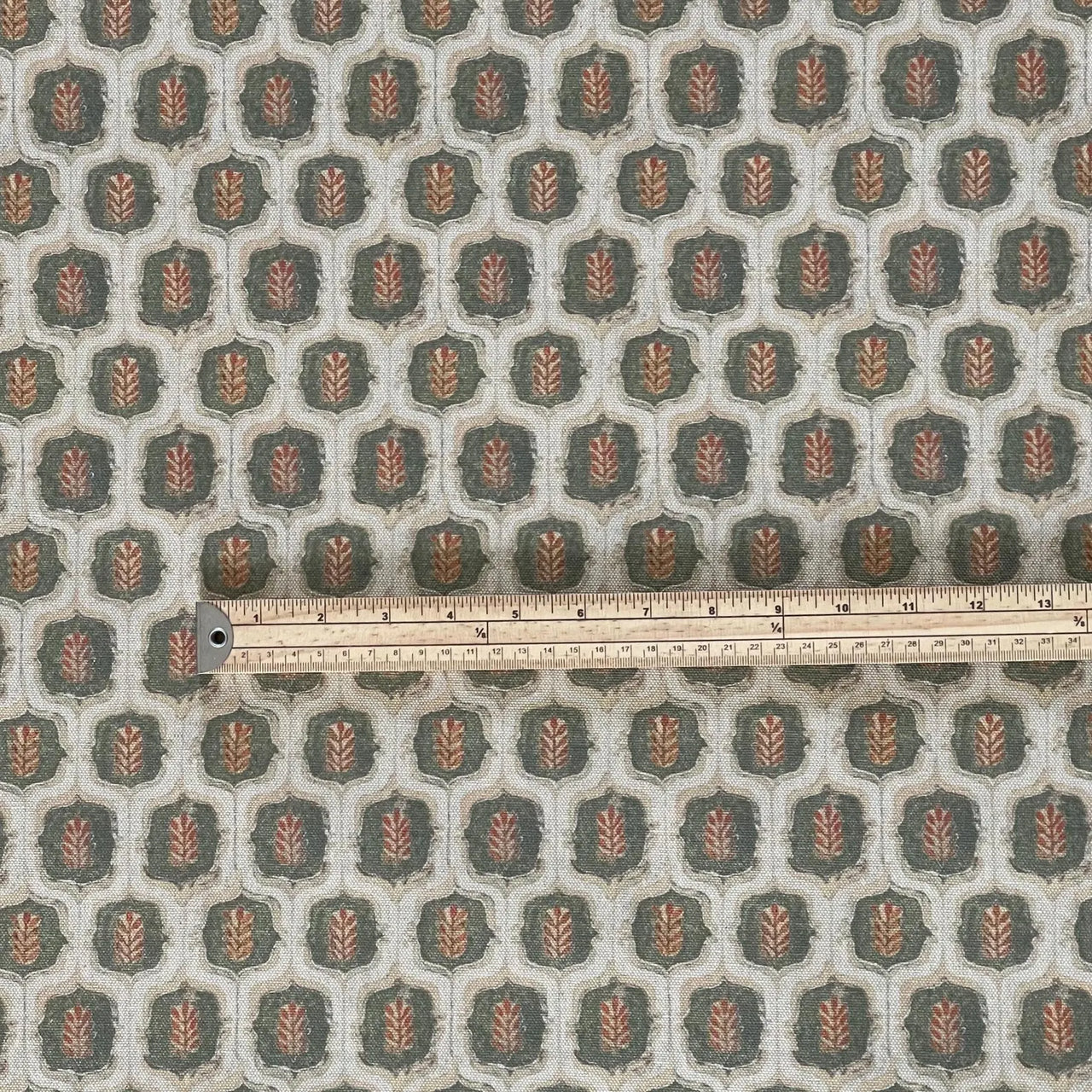 Leaf medallion pattern textile in cotton linen look finish.