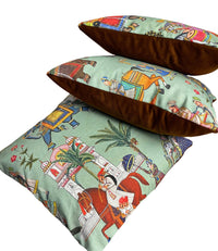 Thumbnail for Three decorative pillows with intricate patterns on a white background