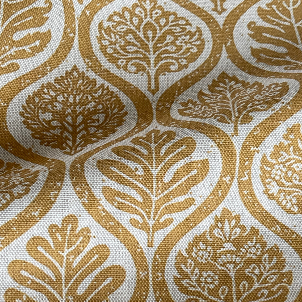 Ogee lattice fabric with stylised leaf shapes in mustard