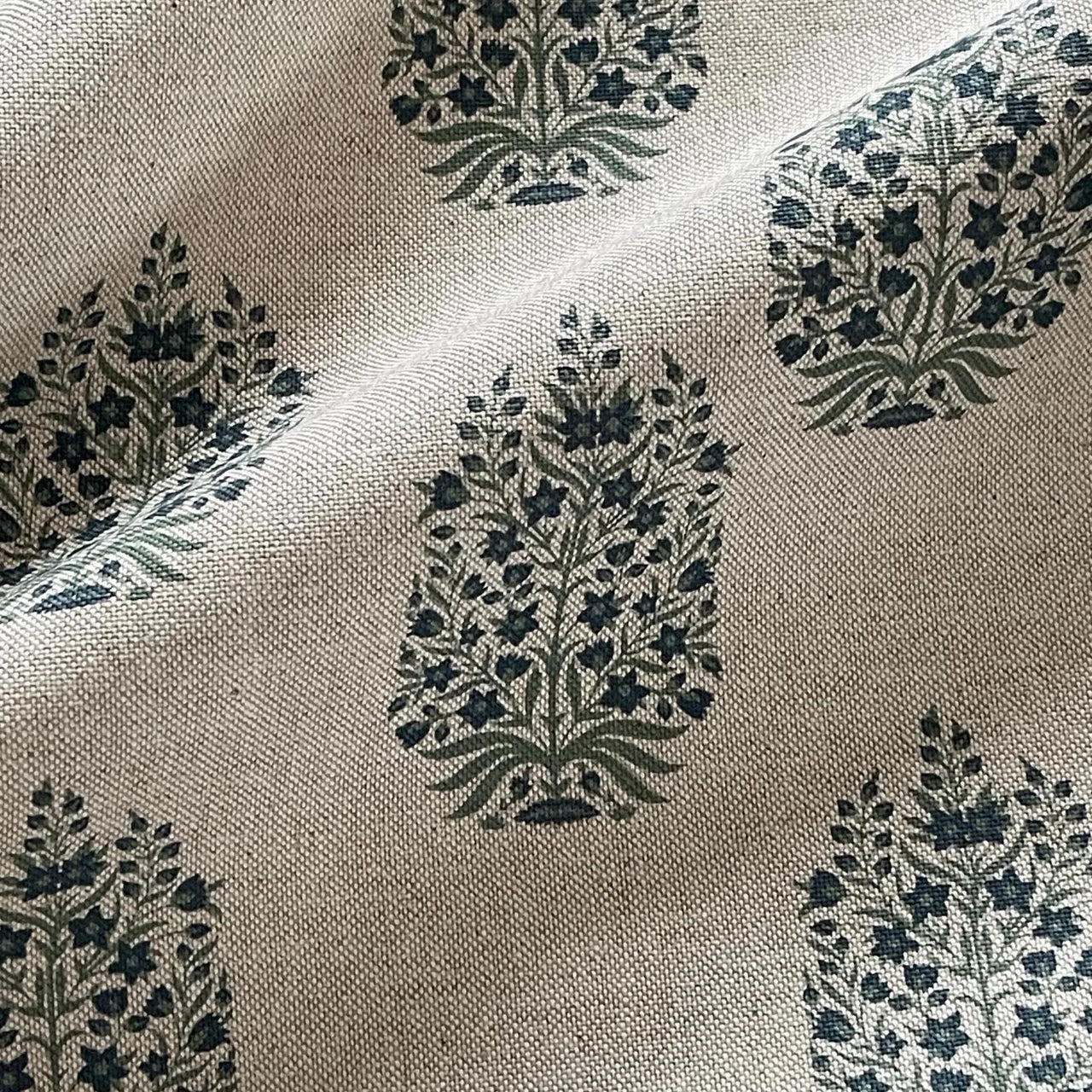 Soft blue decorative fabric with traditional floral medallion pattern