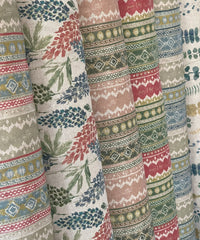 Thumbnail for rolls of fabric with various patterned country style linen print 
