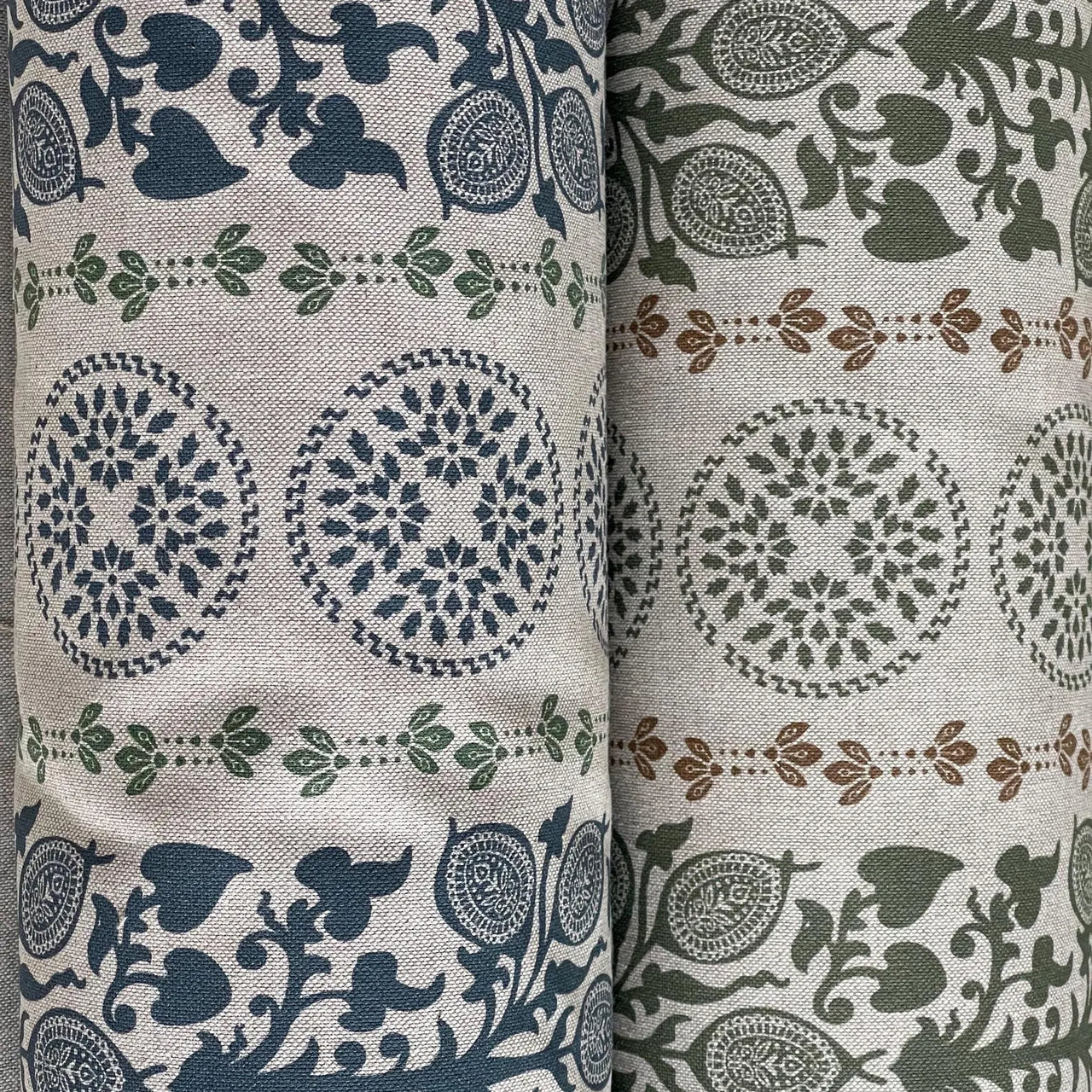 Soft furnishing fabric with botanical stripe and medallion design in green tones