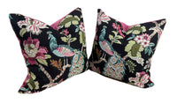 Thumbnail for Pair of decorative pillows with peacock and floral patterns on a black background.