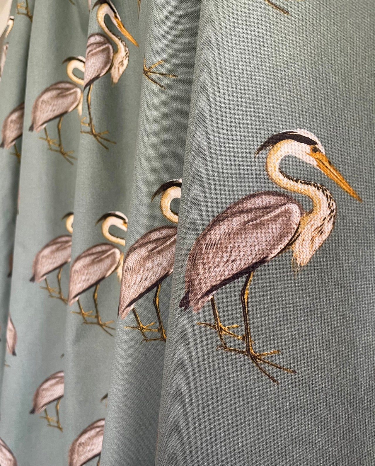 Printed heron fabric suitable for soft furnishings