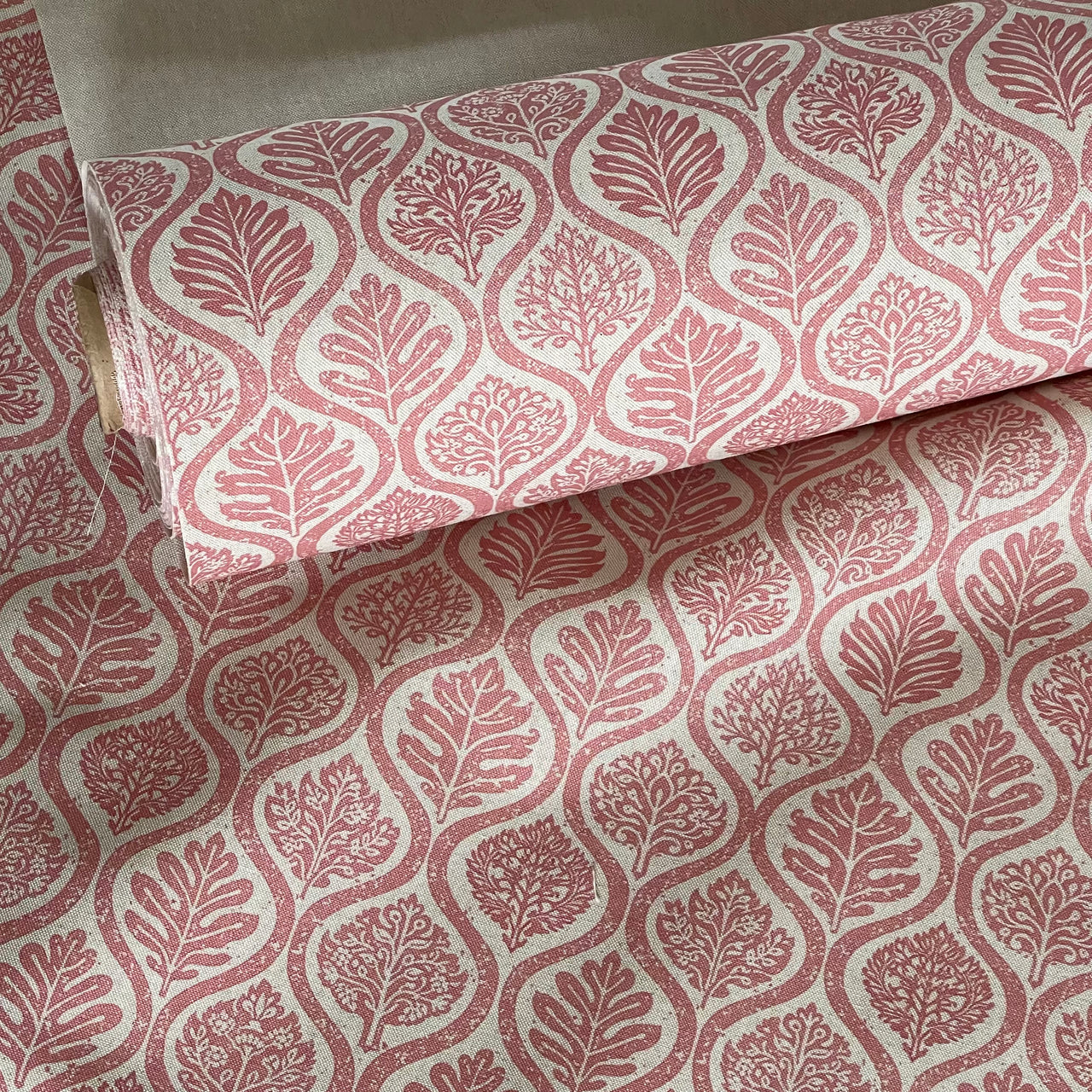 Decorative ogee fabric with folk leaf motifs in dusty rose