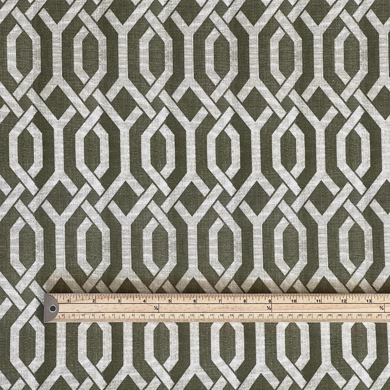 Ruler scale next to trellis textile – detailed fabric planning image for buyers