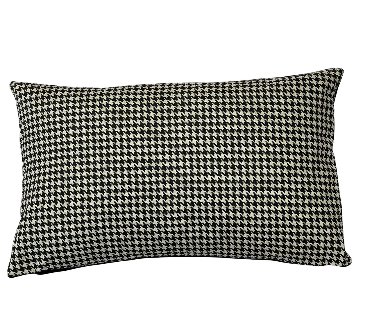 Rectangular 20x12 cushion placed on bed as lumbar support accent.