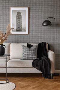 Thumbnail for Modern living room scene with houndstooth accent pillow and neutral décor.