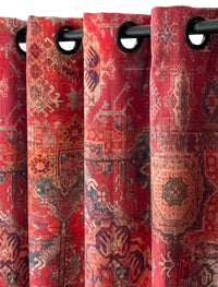 Thumbnail for Red patterned curtains with grommets on a black rod