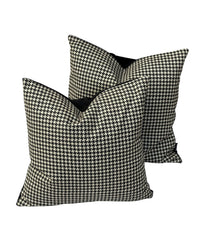 Thumbnail for Pair of houndstooth cushions layered with a plain black velvet pillow behind.