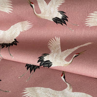 Thumbnail for Japanese-style crane print on smooth blush pink cotton material.