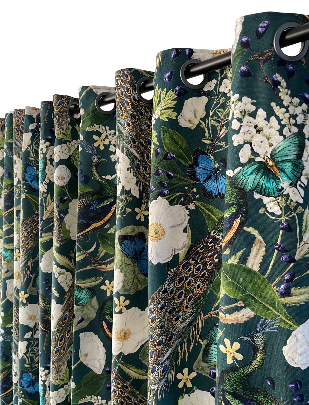 Green botanical curtain with peacock design.