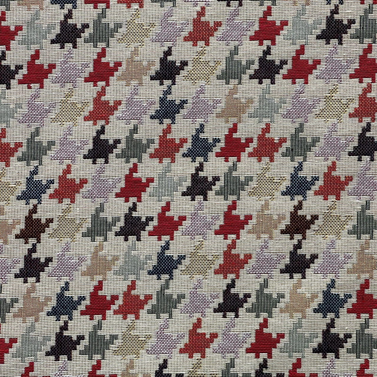 Patterned fabric with red, black, and gray shapes on a beige background