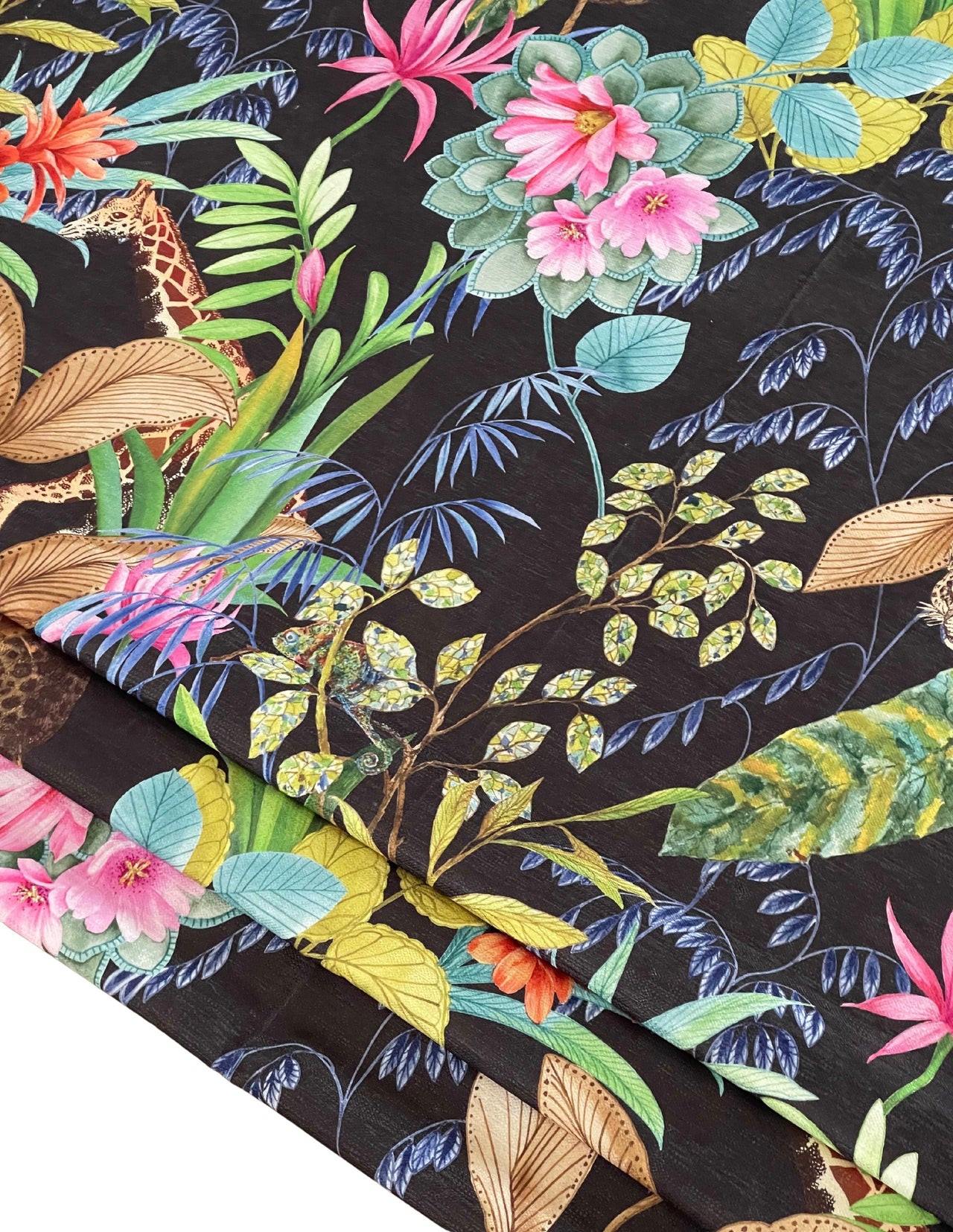 Black fabric with colorful botanical and animal patterns.