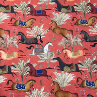 Thumbnail for Patterned fabric with horses and trees on a red background