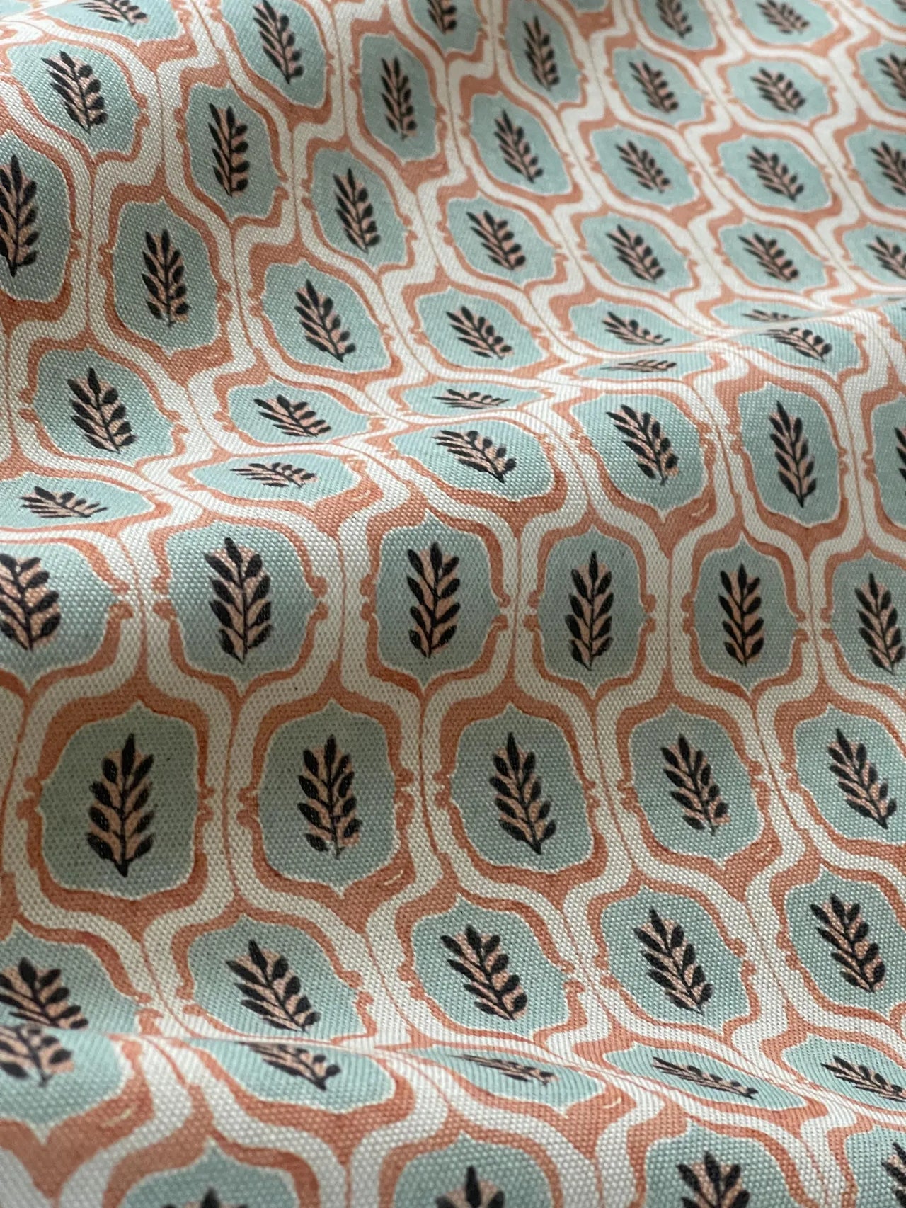 French country fabric with teal leaf medallion print.