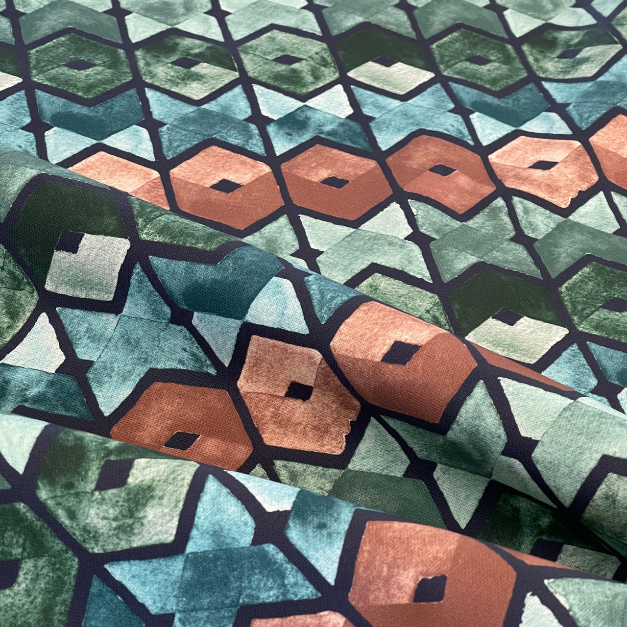 Retro geometric fabric in blue, teal, green, and brown