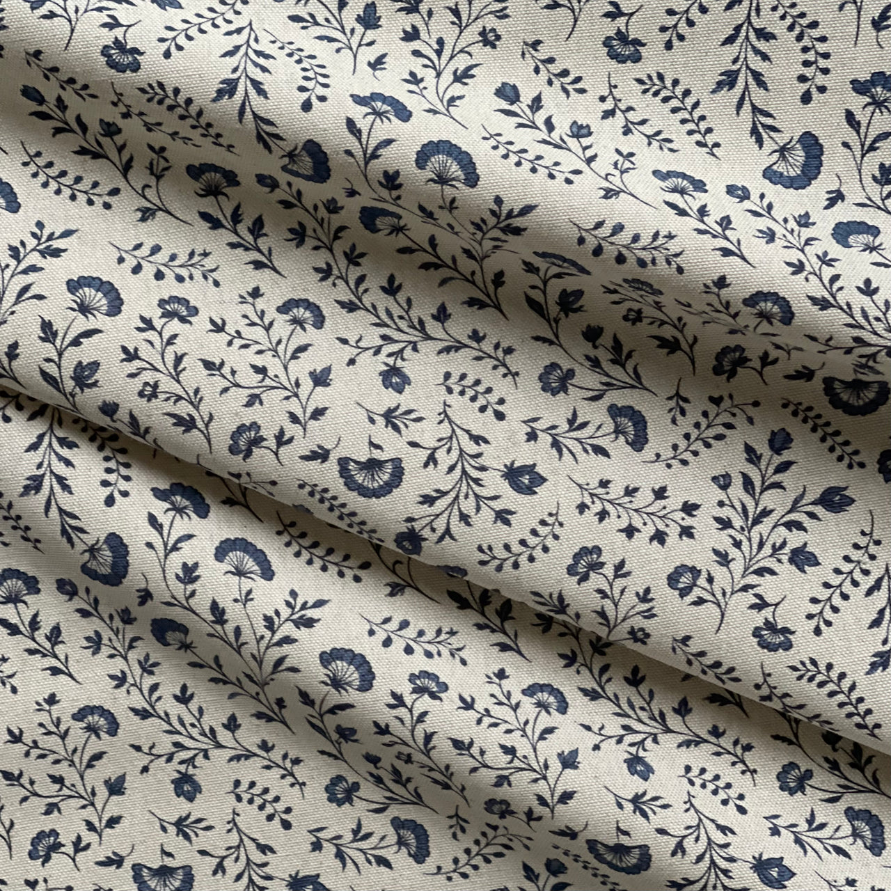 Blue cottage style upholstery fabric with linen texture finish
