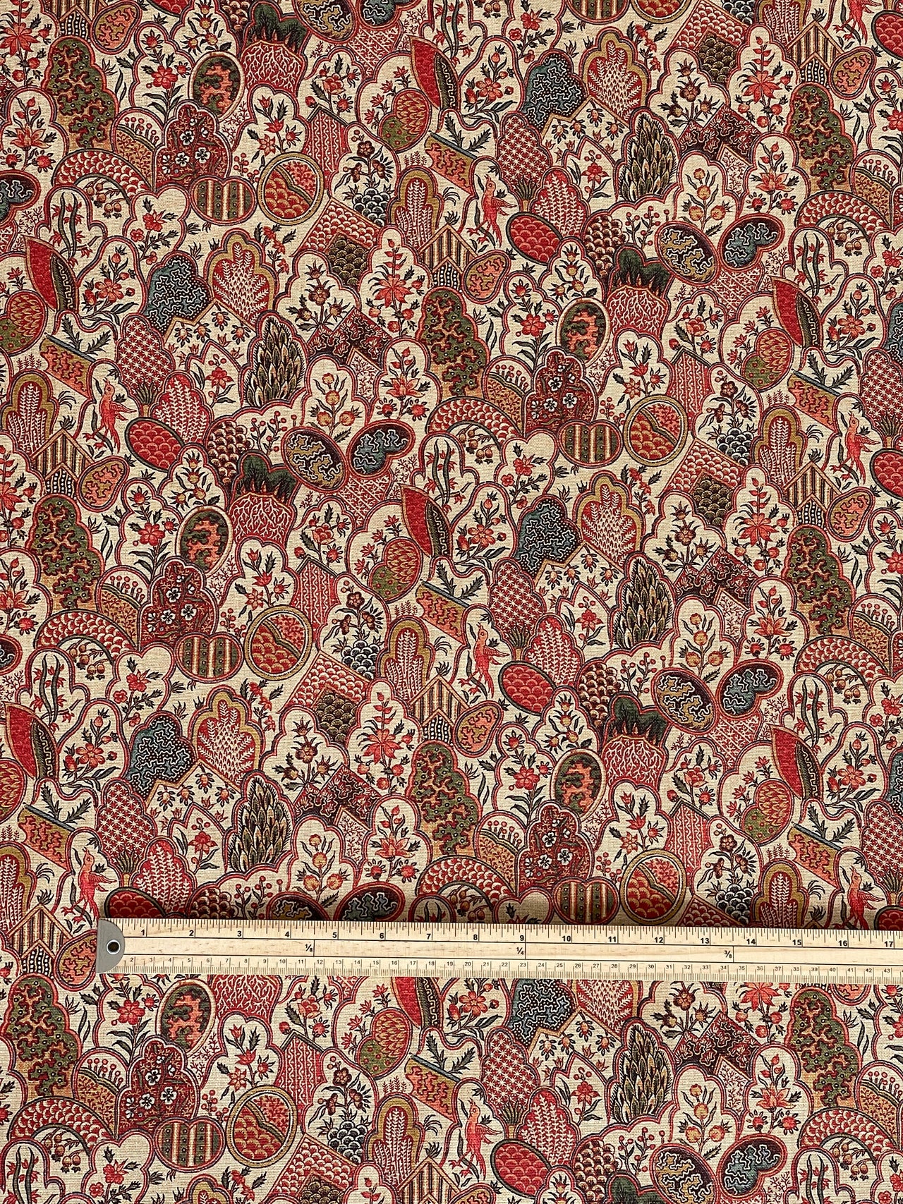 Patterned fabric with a ruler for scale on a white background