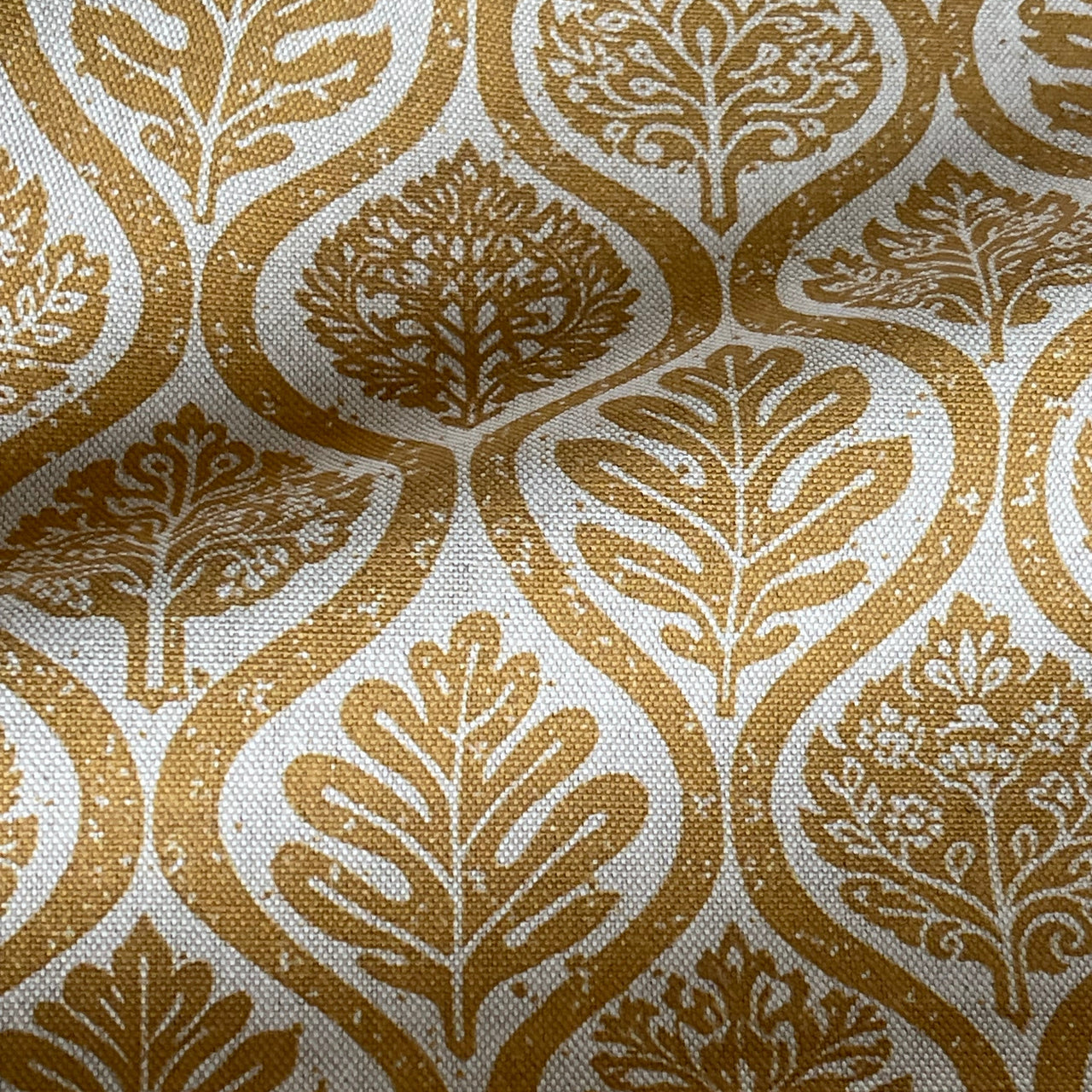 Mustard botanical ogee fabric with leaf pattern on linen look base