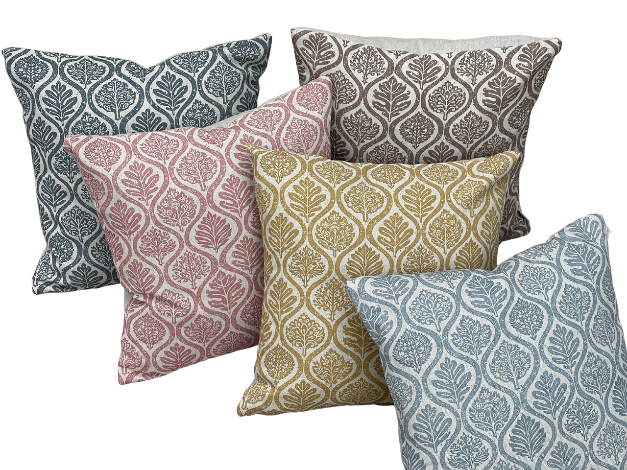 Set of botanical ogee cushion covers in mustard, dusty rose, slate blue, taupe and denim blue on neutral background