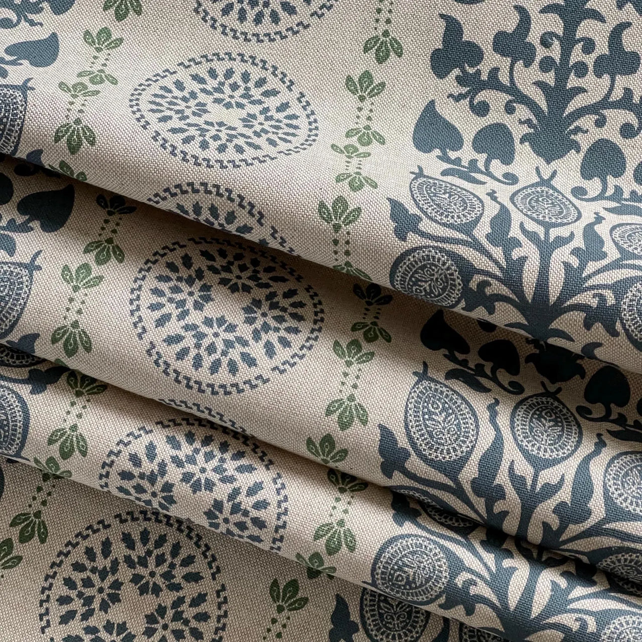 Elegant navy botanical upholstery fabric with symmetrical folk design