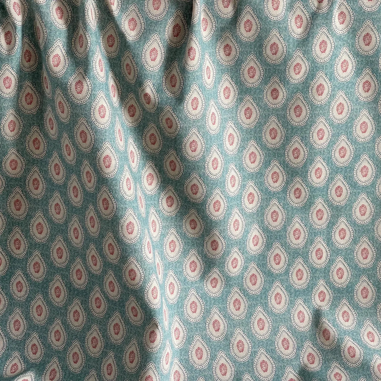 Decorative teal paisley fabric for upholstery and soft furnishings