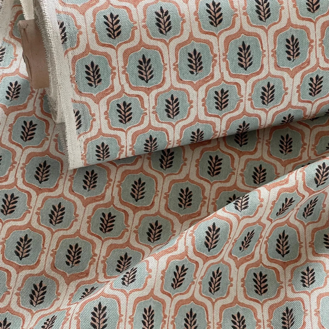 Rustic cotton linen fabric rolls in trellis designs.