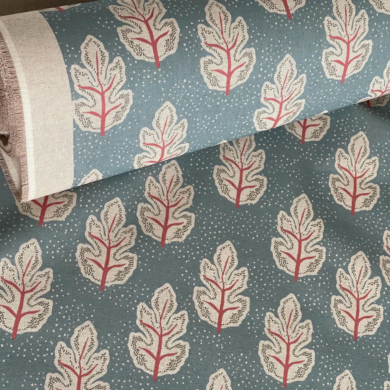 Teal botanical cotton fabric sold by the metre