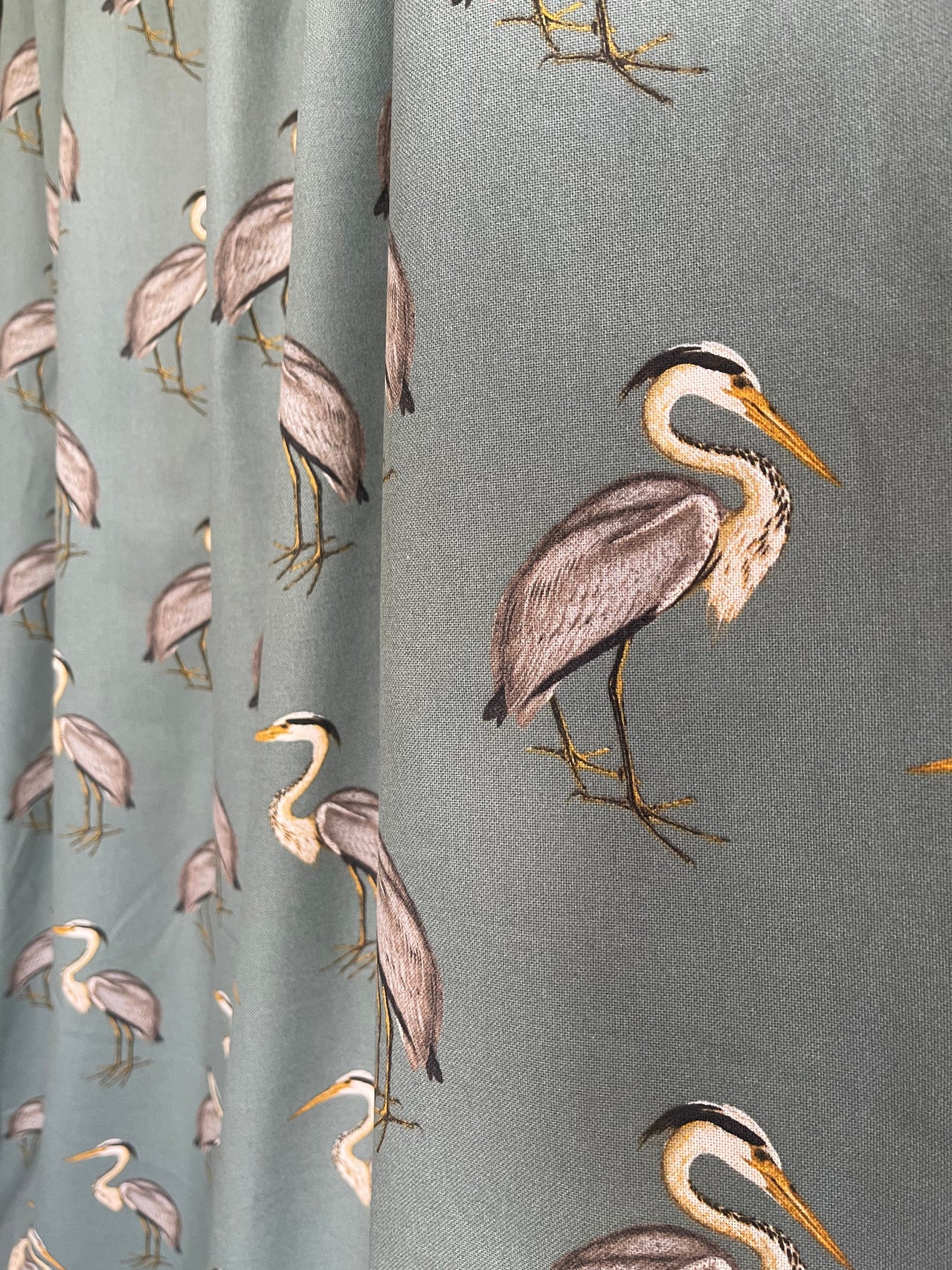 Teal and grey bird motif cotton fabric roll