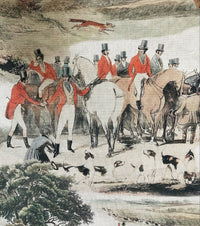 Thumbnail for Vintage hunting scene cotton fabric with riders in red coats on horseback, accompanied by hunting dogs in a countryside landscape with green, grey, and red tones.